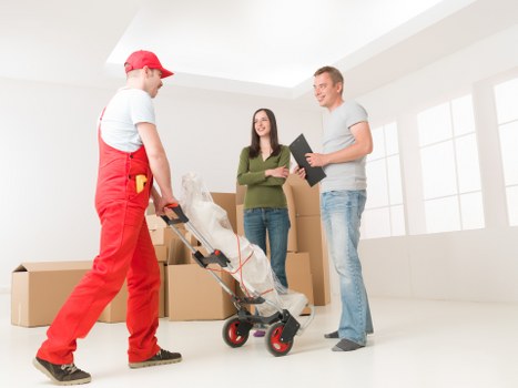 Packed boxes and furniture ready for a house move in Sidcup