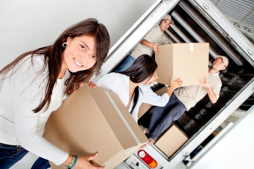 Prepared boxes and household items for moving day in Sidcup