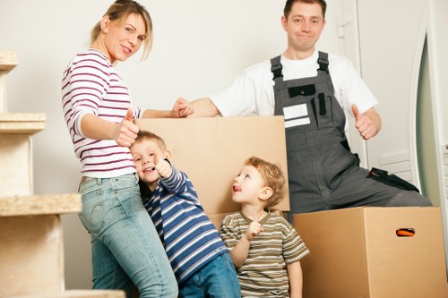 Furniture being carried during a local move in Sidcup